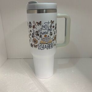 White Travel Mug with Floral and Book Design